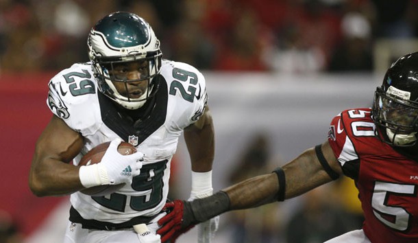 Sep 14, 2015; Atlanta, GA, USA; Philadelphia Eagles running back DeMarco Murray (29) carries the ball past Atlanta Falcons linebacker O'Brien Schofield (50) in the third quarter at the Georgia Dome. Mandatory Credit: Brett Davis-USA TODAY Sports