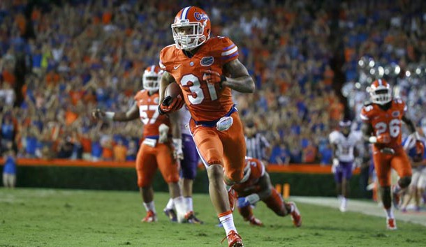 Sep 12, 2015; Gainesville, FL, USA; Florida Gators defensive back Jalen Tabor (31) intercepts the ball and runs it back for a touchdown against the East Carolina Pirates during the second half at Ben Hill Griffin Stadium. Florida Gators defeated the East Carolina Pirates 31-24. Mandatory Credit: Kim Klement-USA TODAY Sports