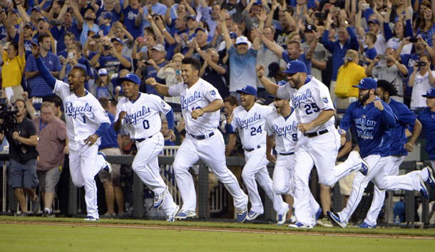 Sep 24, 2015; Kansas City, MO, USA; Kansas City Royals players celebrate after the game against the Seattle Mariners at Kauffman Stadium. Kansas City won the game 10-4 and won the American League central division. Mandatory Credit: John Rieger-USA TODAY Sports