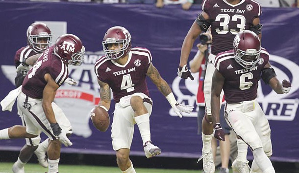 Sep 5, 2015; Houston, TX, USA; Texas A&M Aggies defensive back Noel Ellis (4) celebrates recovering a Arizona State Sun Devils fumble in the second half at NRG Stadium. Aggies won 38 to 17. Thomas B. Shea-USA TODAY Sports