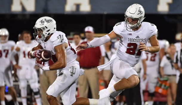 Sep 1, 2016; Miami, FL, USA; Indiana Hoosiers quarterback Richard Lagow (21) hands the ball off to running back Mike Majette (24) during the second half against the FIU Golden Panthers at FIU Stadium. The Indiana Hoosiers defeat the FIU Golden Panthers 34 -13. Photo Credit: Jasen Vinlove-USA TODAY Sports