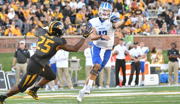 Oct 22, 2016; Columbia, MO, USA; Middle Tennessee Blue Raiders quarterback Brent Stockstill (12) throws a pass as Missouri Tigers linebacker Donavin Newsom (25) pressures during the second half at Faurot Field. Middle Tennessee won 51-45. Photo Credit: Denny Medley-USA TODAY Sports
