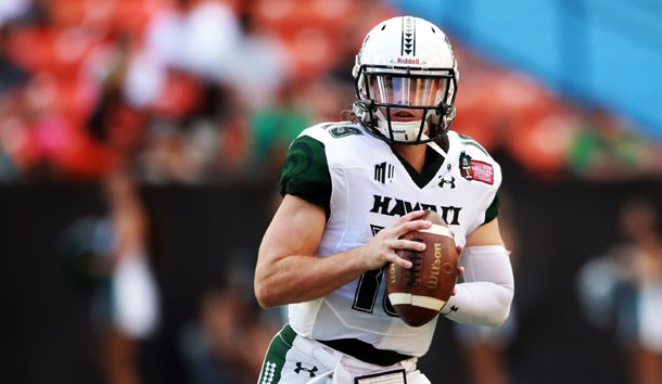 Dec 24, 2016; Honolulu, HI, USA; Hawaii Warriors quarterback Dru Brown (19) looks to make a pass against the Middle Tennessee Blue Raiders during the second quarter at Hawaiian Tel Federal Credit Union Field. Photo Credit: Marco Garcia-USA TODAY Sports