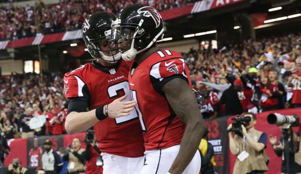 Jan 22, 2017; Atlanta, GA, USA; Atlanta Falcons wide receiver Julio Jones (11) scores a touchdown and is congratulated by quarterback Matt Ryan (2) during the third quarter against the Green Bay Packers in the 2017 NFC Championship Game at the Georgia Dome. Photo Credit: Jason Getz-USA TODAY Sports