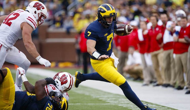 Oct 1, 2016; Ann Arbor, MI, USA; Michigan Wolverines quarterback Shane Morris (7) rushes in the third quarter against the Wisconsin Badgers at Michigan Stadium. Michigan won 14-7. Photo Credit: Rick Osentoski-USA TODAY Sports
