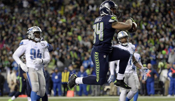 January 7, 2017; Seattle, WA, USA; Seattle Seahawks running back Thomas Rawls (34) runs the ball in for a touchdown against the Detroit Lions during the second half in the NFC Wild Card playoff football game at CenturyLink Field. Photo Credit: Troy Wayrynen-USA TODAY Sports