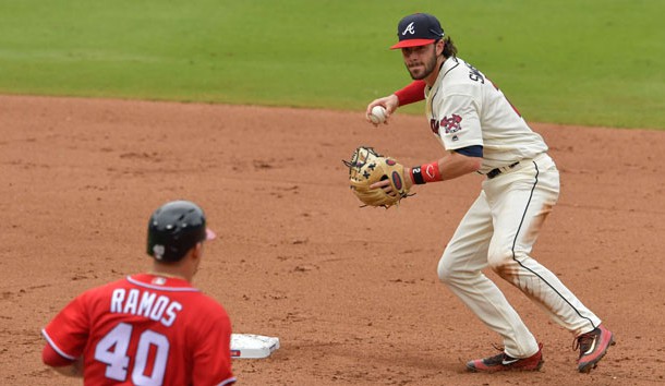 Sep 18, 2016; Atlanta, GA, USA; Atlanta Braves shortstop Dansby Swanson (2) turns a double play past Washington Nationals catcher Wilson Ramos (40) during the fifth inning at Turner Field. Photo Credit: Dale Zanine-USA TODAY Sports
