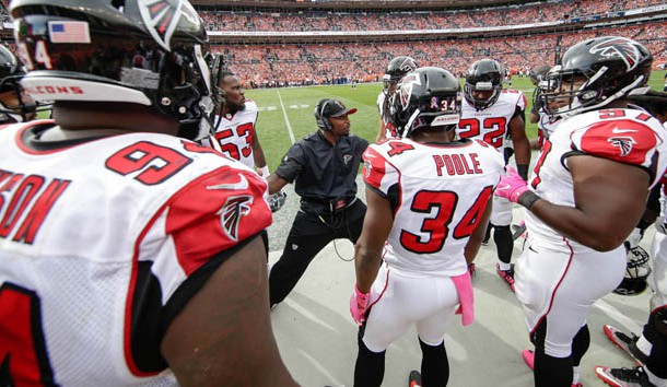 Oct 9, 2016; Denver, CO, USA; Atlanta Falcons secondary coach Marquand Manuel talks with defensive back Brian Poole (34) and defensive end Tyson Jackson (94) and teammates in the second quarter against the Denver Broncos at Sports Authority Field at Mile High. The Falcons won 23-16. Photo Credit: Isaiah J. Downing-USA TODAY Sports