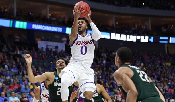 Mar 19, 2017; Tulsa, OK, USA; Kansas Jayhawks guard Frank Mason III (0) goes up for a shot as Michigan State Spartans guard Miles Bridges (22) guards during the first half in the second round of the 2017 NCAA Tournament at BOK Center. Photo Credit: Brett Rojo-USA TODAY Sports
