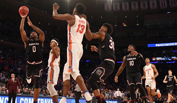 Mar 26, 2017; New York, NY, USA; South Carolina Gamecocks guard Sindarius Thornwell (0) shoots the ball against Florida Gators forward Kevarrius Hayes (13) during the second half in the finals of the East Regional of the 2017 NCAA Tournament at Madison Square Garden. Photo Credit: Robert Deutsch-USA TODAY Sports