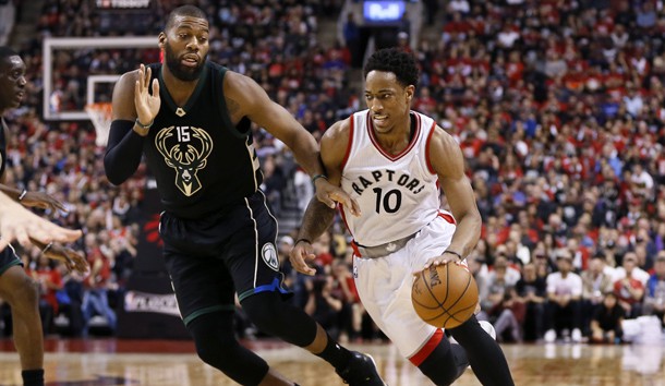 Apr 15, 2017; Toronto, Ontario, CAN; Toronto Raptors guard DeMar DeRozan (10) tries to get around Milwaukee Bucks center Greg Monroe (15) in game one of the first round of the 2017 NBA Playoffs at Air Canada Centre. Milwaukee defeated Toronto 97-83. Photo Credit: John E. Sokolowski-USA TODAY Sports