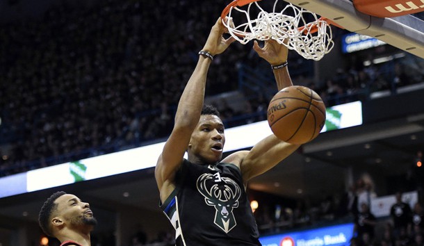 Apr 20, 2017; Milwaukee, WI, USA; Milwaukee Bucks forward Giannis Antetokounmpo (34) dunks a basket in the third quarter against Toronto Raptors guard Norman Powell (24) in game three of the first round of the 2017 NBA Playoffs at BMO Harris Bradley Center. Antetokounmpo scored 19 points to help the Bucks beat the Raptors 104-77. Photo Credit: Benny Sieu-USA TODAY Sports