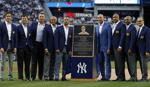 May 14, 2017; Bronx, NY, USA; Former New York Yankees shortstop Derek Jeter poses for a photo with his monument park plaque along with former teammates during a pre-game ceremony to also retire his jersey number before the game against the Houston Astros at Yankee Stadium. Photo Credit: Adam Hunger-USA TODAY Sports