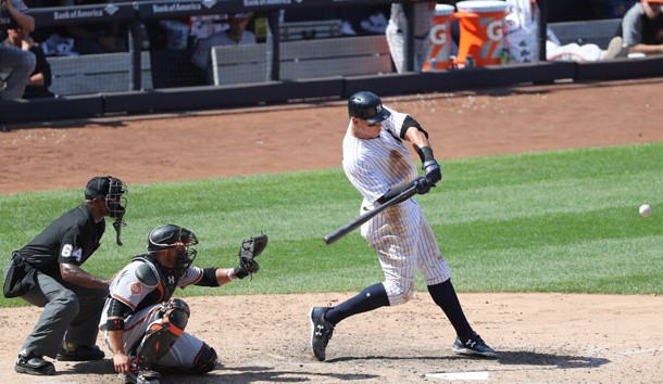 Jun 11, 2017; Bronx, NY, USA; New York Yankees right fielder Aaron Judge (99) hits a home run to left center field during the sixth inning against the Baltimore Orioles at Yankee Stadium. Photo Credit: Anthony Gruppuso-USA TODAY Sports