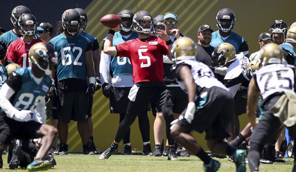 May 26, 2017; Jacksonville, FL, USA; Jacksonville Jaguars quarterback Blake Bortles (5) works out during organized team activities at Everbank Field. Photo Credit: Logan Bowles-USA TODAY Sports