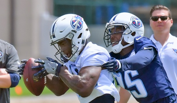 Jun 13, 2017; Nashville, TN, USA; Tennessee Titans wide receiver Corey Davis (84) catches a pass against Tennessee corner back Adoree Jackson (25) St Thomas Sports Park Photo Credit: Jim Brown-USA TODAY Sports