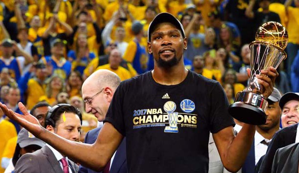 Jun 12, 2017; Oakland, CA, USA; Golden State Warriors forward Kevin Durant (35) celebrates after winning the NBA Fianls MVP in game five of the 2017 NBA Finals at Oracle Arena. Photo Credit: Kelley L Cox-USA TODAY Sports