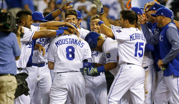 Jun 6, 2017; Kansas City, MO, USA; Kansas City Royals players congratulate designated hitter Mike Moustakas (8) at home plate after hitting a walk-off home run against the Houston Astros in the ninth inning at Kauffman Stadium. The Royals won 9-7. Photo Credit: Jay Biggerstaff-USA TODAY Sports