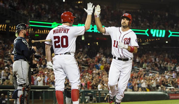 Jun 13, 2017; Washington, DC, USA; Washington Nationals first baseman Ryan Zimmerman (11) celebrates with Nationals second baseman Daniel Murphy (20) after hitting a two-run home run in the sixth inning against the Atlanta Braves at Nationals Park. Photo Credit: Patrick McDermott-USA TODAY Sports