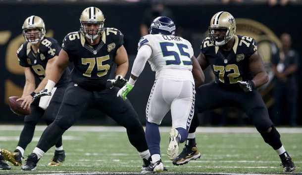 Oct 30, 2016; New Orleans, LA, USA; New Orleans Saints offensive linemen Andrus Peat (75) and Terron Armstead (72) block Seattle Seahawks defensive end Frank Clark (55) in the second half at the Mercedes-Benz Superdome. The Saints won, 25-20. Photo Credit: Chuck Cook-USA TODAY Sports