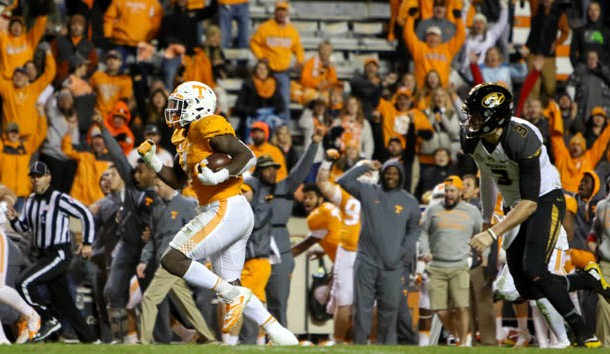 Nov 19, 2016; Knoxville, TN, USA; Tennessee Volunteers defensive lineman Jonathan Kongbo (1) returns an interception for a touchdown against the Missouri Tigers during the second half at Neyland Stadium. Tennessee won 63 to 37. Photo Credit: Randy Sartin-USA TODAY Sports
