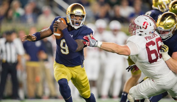 Oct 15, 2016; South Bend, IN, USA; Notre Dame Fighting Irish quarterback Malik Zaire (9) is pressured by Stanford Cardinal defensive tackle Harrison Phillips (66) in the third quarter at Notre Dame Stadium. Stanford won 17-10. Photo Credit: Matt Cashore-USA TODAY Sports