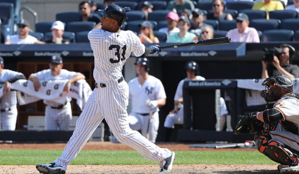 Jun 11, 2017; Bronx, NY, USA; New York Yankees center fielder Aaron Hicks (31) doubles to deep right center allowing two runners to score during the seventh inning against the Baltimore Orioles at Yankee Stadium. Photo Credit: Anthony Gruppuso-USA TODAY Sports
