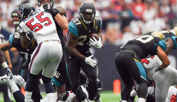 Sep 10, 2017; Houston, TX, USA; Jacksonville Jaguars running back Leonard Fournette (27) runs the ball around Houston Texans defense during the third quarter at NRG Stadium. Photo Credit: Shanna Lockwood-USA TODAY Sports