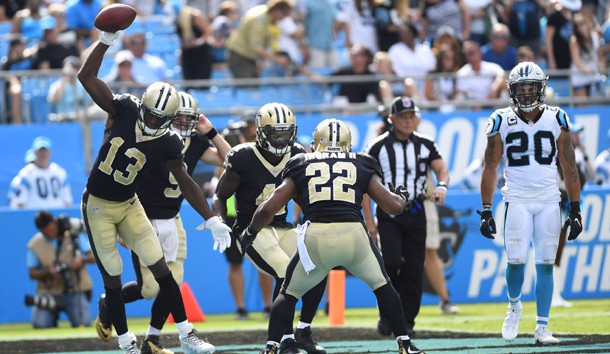 Sep 24, 2017; Charlotte, NC, USA; New Orleans Saints running back Alvin Kamara (41) celebrates with wide receiver Michael Thomas (13), quarterback Drew Brees (9) and running back Mark Ingram (22) after scoring a touchdown in the fourth quarter at Bank of America Stadium. Photo Credit: Bob Donnan-USA TODAY Sports