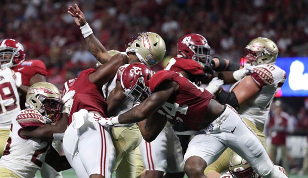 Sep 2, 2017; Atlanta, GA, USA; Alabama Crimson Tide defensive lineman Da'Shawn Hand (9) and linebacker Terrell Lewis (24) hit Florida State Seminoles quarterback Deondre Francois (12) in the fourth quater at Mercedes-Benz Stadium. Photo Credit: Jason Getz-USA TODAY Sports