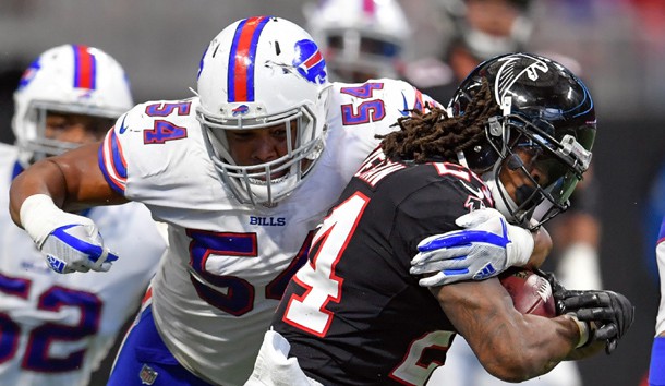 Oct 1, 2017; Atlanta, GA, USA; Atlanta Falcons running back Devonta Freeman (24) is tackled by Buffalo Bills linebacker Eddie Yarbrough (54) during the fourth quarter at Mercedes-Benz Stadium. Photo Credit: Dale Zanine-USA TODAY Sports