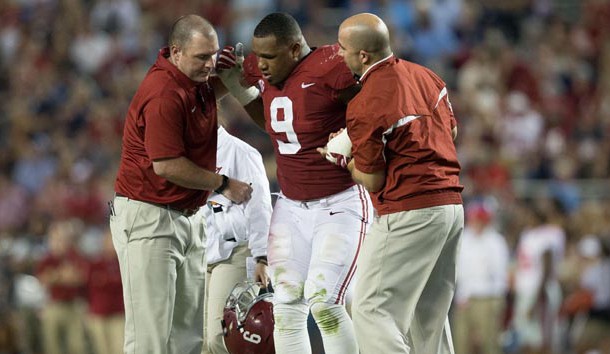Sep 30, 2017; Tuscaloosa, AL, USA; Alabama Crimson Tide defensive lineman Da'Shawn Hand (9) is helped up after suffering an injury during a play against the Mississippi Rebels at Bryant-Denny Stadium. Photo Credit: Marvin Gentry-USA TODAY Sports