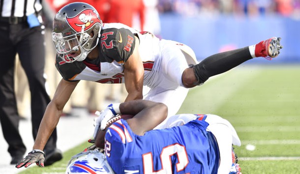Oct 22, 2017; Orchard Park, NY, USA; Tampa Bay Buccaneers cornerback Brent Grimes (24) makes a tackle on Buffalo Bills running back LeSean McCoy (25) during the fourth quarter of a game at New Era Field. Photo Credit: Mark Konezny-USA TODAY Sports