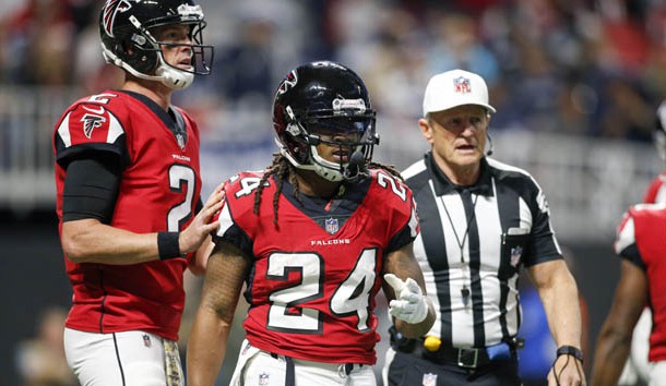 Nov 12, 2017; Atlanta, GA, USA; Atlanta Falcons running back Devonta Freeman (24) is sent off the field with an injury by referee Ed Hochuli against the Dallas Cowboys in the first quarter at Mercedes-Benz Stadium. Photo Credit: Brett Davis-USA TODAY Sports