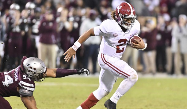 Nov 11, 2017; Starkville, MS, USA; Alabama Crimson Tide quarterback Jalen Hurts (2) runs the ball past Mississippi State Bulldogs defensive lineman Jeffery Simmons (94) during the fourth quarter at Davis Wade Stadium. Photo Credit: Matt Bush-USA TODAY Sports