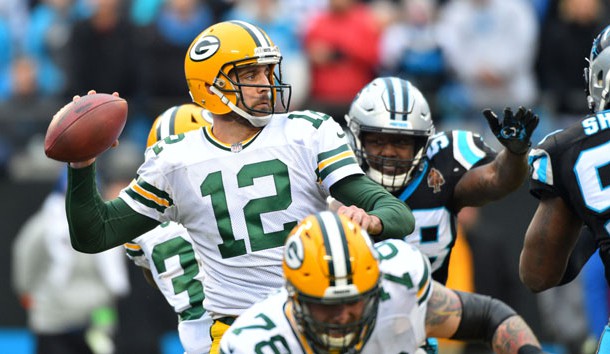 Dec 17, 2017; Charlotte, NC, USA; Green Bay Packers quarterback Aaron Rodgers (12) looks to pass as Carolina Panthers outside linebacker Thomas Davis (58) pressures in the fourth quarter at Bank of America Stadium. Photo Credit: Bob Donnan-USA TODAY Sports