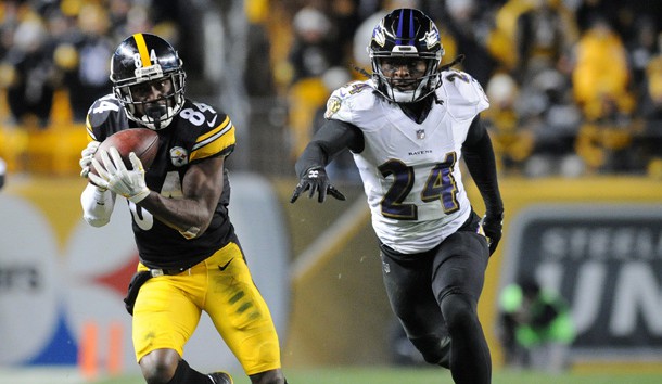 Dec 10, 2017; Pittsburgh, PA, USA; Pittsburgh Steelers wide receiver Antonio Brown (84) catches a pass for a first down in the fourth quarter as Baltimore Ravens cornerback Brandon Carr (24) gives chase at Heinz Field. The play set up a Steelers touchdown as they went on to win 39-38. Photo Credit: Philip G. Pavely-USA TODAY Sports