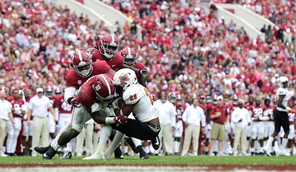Nov 18, 2017; Tuscaloosa, AL, USA; Mercer Bears running back Tee Mitchell (28) is tackled by Alabama Crimson Tide linebacker Dylan Moses (18) during the third quarter at Bryant-Denny Stadium. Photo Credit: Adam Hagy-USA TODAY Sports