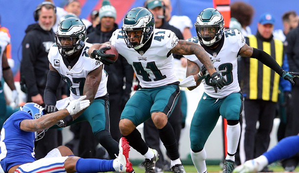 Dec 17, 2017; East Rutherford, NJ, USA; Philadelphia Eagles corner back Ronald Darby (41) runs back an interception against New York Giants wide receiver Roger Lewis (18) during the second quarter at MetLife Stadium. Photo USA TODAY Sports