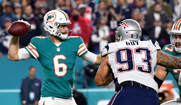 Dec 11, 2017; Miami Gardens, FL, USA; Miami Dolphins quarterback Jay Cutler (6) throws a pass as New England Patriots defensive end Lawrence Guy (93) applies pressure during the first half at Hard Rock Stadium. Photo Credit: Steve Mitchell-USA TODAY Sports