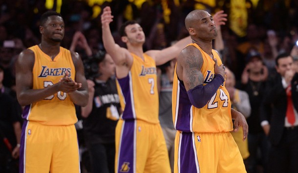 Apr 13, 2016; Los Angeles, CA, USA; Los Angeles Lakers forward Kobe Bryant (24) heads off the court after being replaced by Los Angeles Lakers forward Ryan Kelly (not pictured) in the final seconds of the Lakers win over the Utah Jazz at Staples Center. Bryant scored 60 points in the final game of his NBA career. Photo Credit: Robert Hanashiro-USA TODAY Sports