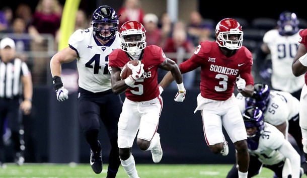 Dec 2, 2017; Arlington, TX, USA; Oklahoma Sooners wide receiver Marquise Brown (5) runs with the ball during the first quarter against the TCU Horned Frogs in the Big 12 Championship game at AT&;T Stadium. Photo Credit: Kevin Jairaj-USA TODAY Sports