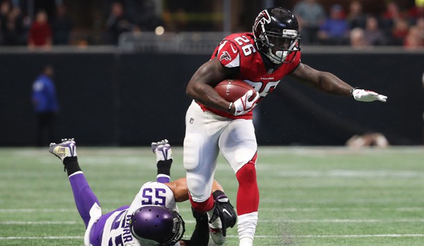 Dec 3, 2017; Atlanta, GA, USA; Atlanta Falcons running back Tevin Coleman (26) carries the ball as Minnesota Vikings linebacker Anthony Barr (55) tackles in the first quarter against the Minnesota Vikings at Mercedes-Benz Stadium. Photo Credit: Jason Getz-USA TODAY Sports