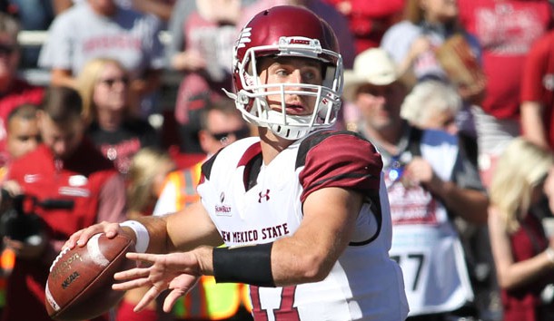 Sep 30, 2017; Fayetteville, AR, USA; New Mexico State Aggies quarterback Tyler Rogers (17) throws a pass in the first quarter against the Arkansas Razorbacks at Donald W. Reynolds Razorback Stadium. Photo Credit: Nelson Chenault-USA TODAY Sports