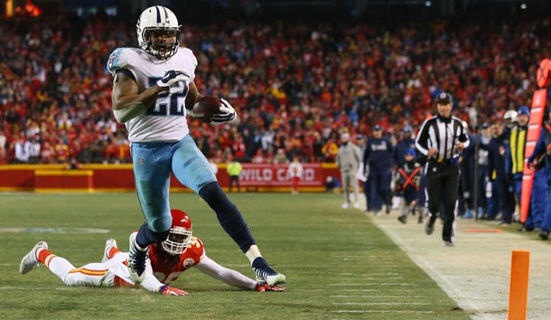 Jan 6, 2018; Kansas City, MO, USA; Tennessee Titans running back Derrick Henry (22) gets past Kansas City Chiefs free safety Ron Parker (38) to score a touchdown in the fourth quarter in the AFC Wild Card playoff football game at Arrowhead Stadium. Photo Credit: Jay Biggerstaff-USA TODAY Sports