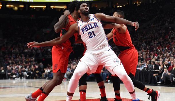 Dec 28, 2017; Portland, OR, USA; Philadelphia 76ers center Joel Embiid (21) boxes out Portland Trail Blazers forward Ed Davis (17) and guard CJ McCollum (3) during the first quarter at the Moda Center. Photo Credit: Steve Dykes-USA TODAY Sports