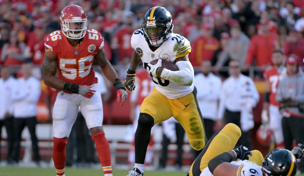 Oct 15, 2017; Kansas City, MO, USA; Pittsburgh Steelers running back Le'Veon Bell (26) runs the ball as Kansas City Chiefs inside linebacker Derrick Johnson (56) defends during the first half at Arrowhead Stadium. Photo Credit: Denny Medley-USA TODAY Sports