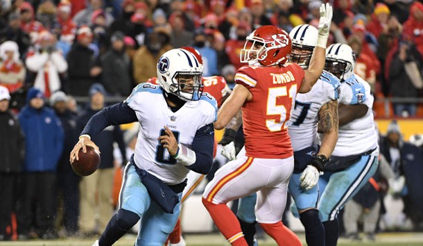 Jan 6, 2018; Kansas City, MO, USA; Tennessee Titans quarterback Marcus Mariota (8) scrambles away from Kansas City Chiefs outside linebacker Frank Zombo (51) during the fourth quarter in the AFC Wild Card playoff football game at Arrowhead Stadium. Photo Credit: Denny Medley-USA TODAY Sports
