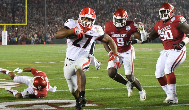 Jan 1, 2018; Pasadena, CA, USA; Georgia Bulldogs running back Nick Chubb (27) runs in a touchdown against the Oklahoma Sooners in the fourth quarter in the 2018 Rose Bowl college football playoff semifinal game at Rose Bowl Stadium. Photo Credit: Jayne Kamin-Oncea-USA TODAY Sports