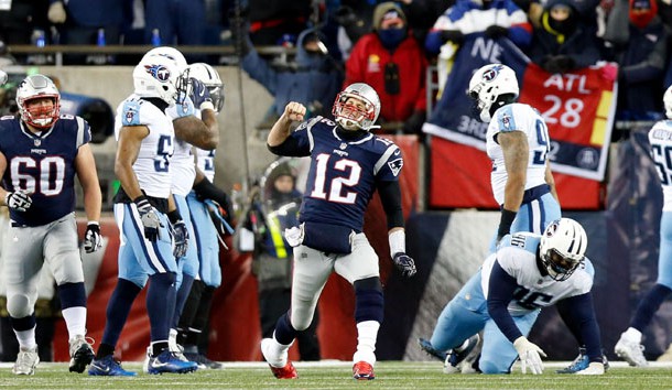 Jan 13, 2018; Foxborough, MA, USA; New England Patriots quarterback Tom Brady (12) celebrates throwing a touchdown pass against the Tennessee Titans during the third quarter of the AFC Divisional playoff game at Gillette Stadium. Photo Credit: Greg M. Cooper-USA TODAY Sports